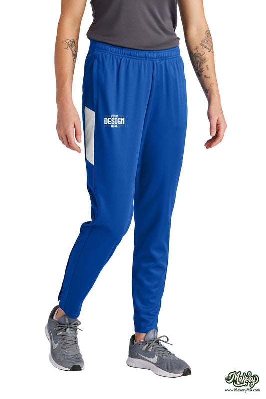 Sport-Tek Women's Travel Pant. LPST800 (Choose Your Design)
